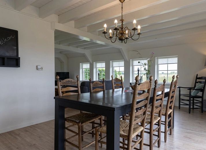 Het Assenhoekje, ein gemuetliches Ferienhaus in Den Ham, Twente, bietet eine herrliche Aussicht auf die gruene Landschaft von Overijssel.