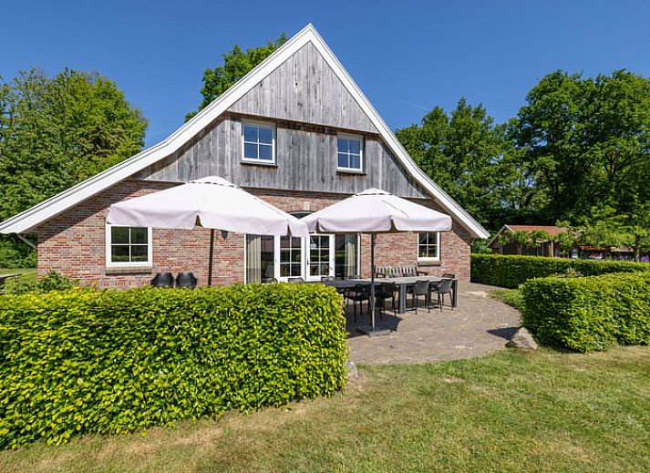 Gemuetliches Ferienhaus in De Lutte, Twente mit Spielplatz und gruener Umgebung in Overijssel, ideal fuer einen entspannten Aufenthalt.