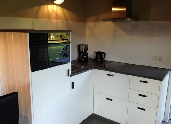 Gezellige woonkamer van Huisje in Ootmarsum, vakantieverblijf in Twente, met moderne voorzieningen.