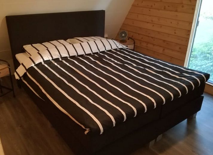 Gezellige woonkamer van Huisje in Ootmarsum, vakantieverblijf in Twente, met moderne voorzieningen.