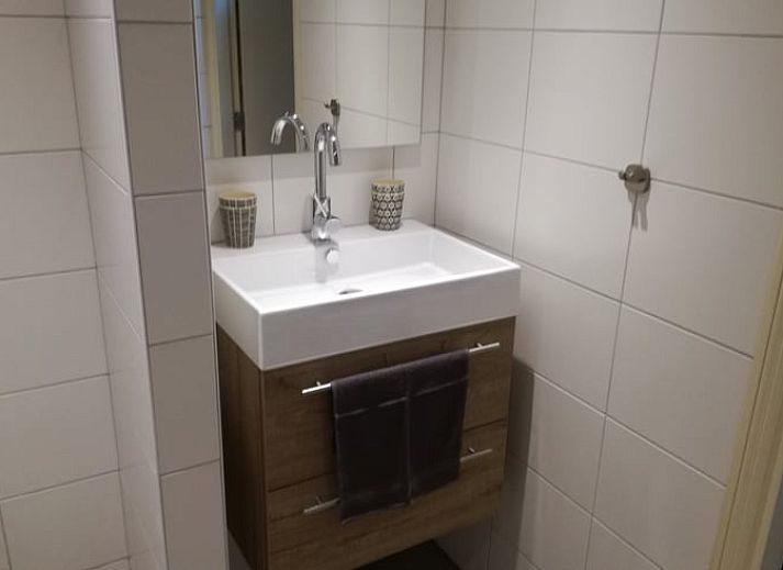 Comfortabele zithoek in Huisje in Ootmarsum, vakantiehuis in Twente, ideaal voor ontspanning.