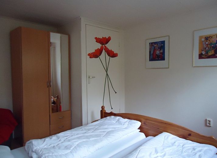 Veranda des Ferienhauses Mapadodo in Nutter, Twente mit Blick auf die grne Natur.