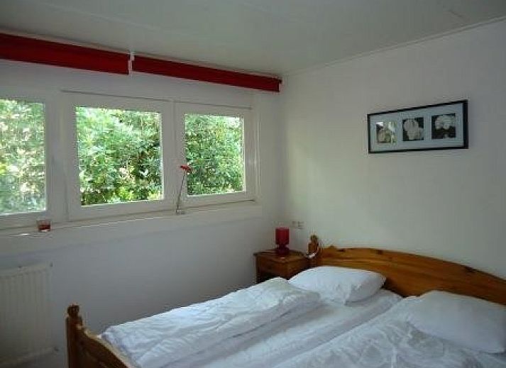 Mapadodo Ferienhaus in Nutter, Twente, umgeben von ppiger Natur und Bumen.