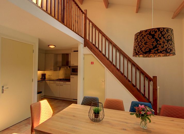 Dining room of the Witker vacation home in Ootmarsum, Twente with modern kitchen.