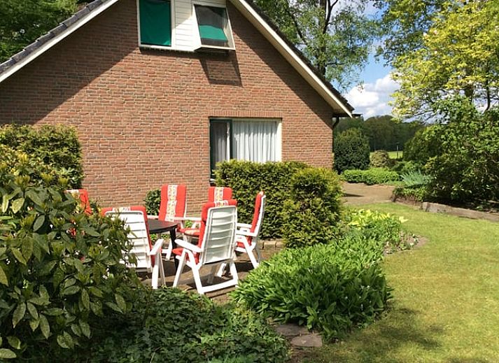 Cozy wood stove in vacation home Hezingen, Twente, for warm evenings.