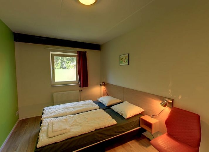 Gezellig vakantiehuisje in Hezingen met groene tuin, ideaal gelegen in Twente, Overijssel.