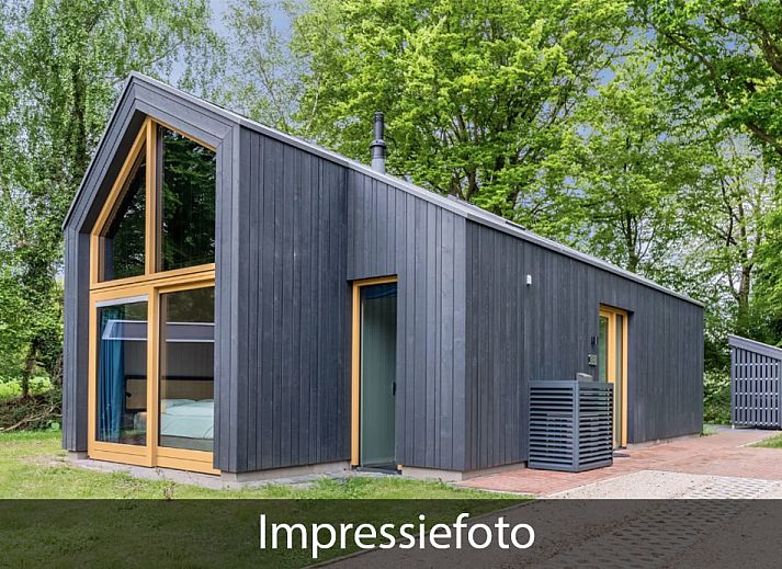 Vrijstaande woning in Beuningen, Twente, vakantiehuis omringd door groene natuur en rustgevende omgeving.