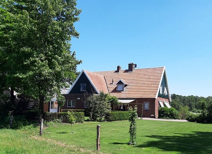 Huisje in Beuningen, vakantiehuis in Twente, Overijssel met groene tuin en landelijke omgeving, ideaal voor rustzoekers.