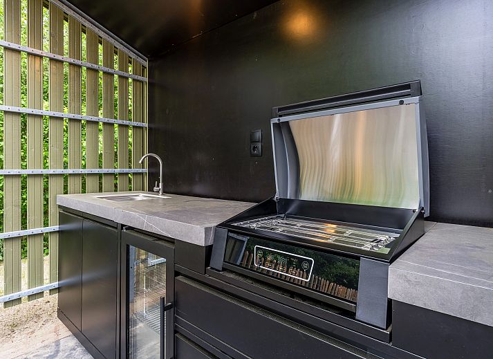 Comfortable sitting room in 4-bed dog house 4LD, Beuningen, Twente, for relaxation.