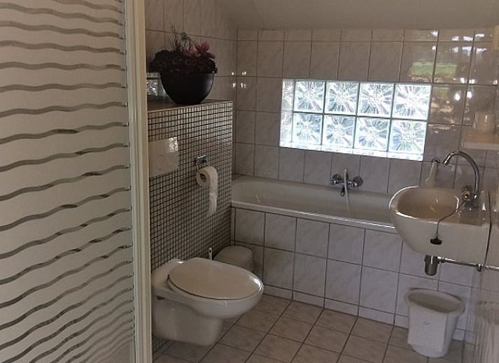 Gezellig terras met uitzicht bij Huisje in Vasse, vakantieaccommodatie in Twente, Overijssel.