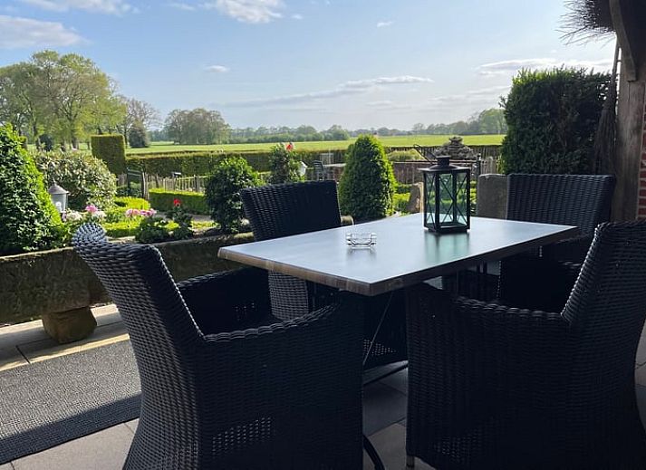 Uitzicht op groene velden bij Vakantiehuisje in Vasse, Twente, Overijssel.