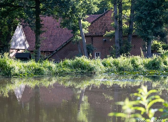 View from bedroom of Holiday Home in De Pollen, Geesteren, to cozy living room.