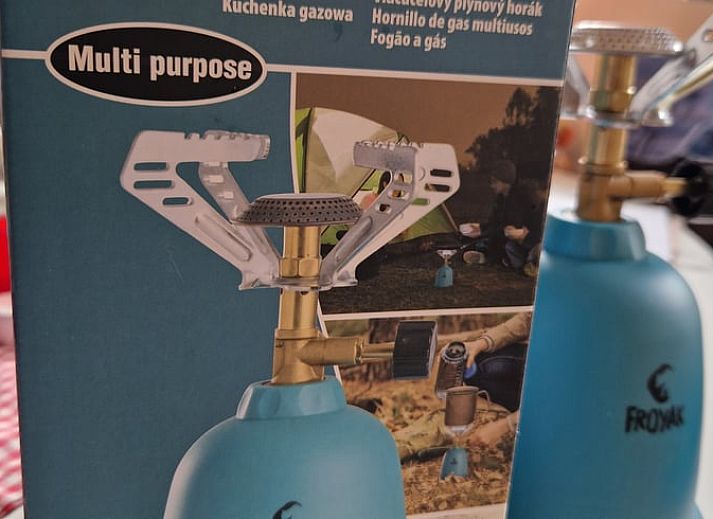 Cozy indoor area of Holiday Home in Overdinkel, Twente, with comfortable sitting area and bed.