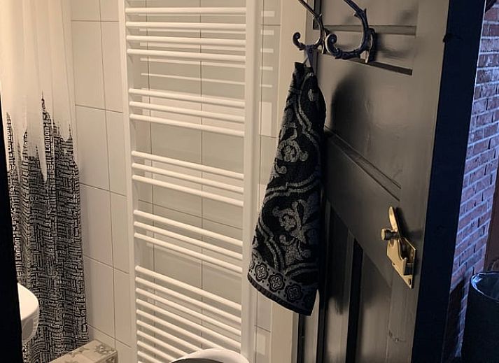 Stilvolles Wohnzimmer in Cottage in Weerselo, Ferienhaus in Twente, Overijssel mit moderner Einrichtung.