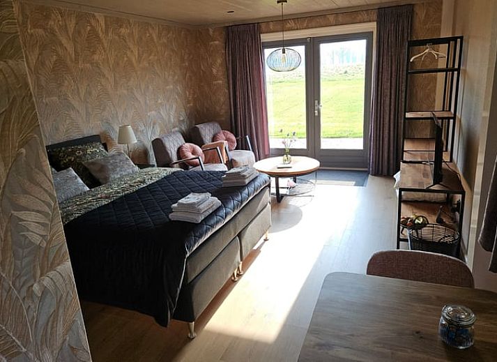 Huisje in Weerselo, vakantiehuis in Twente met groene tuin en terras, ideaal voor natuurliefhebbers.