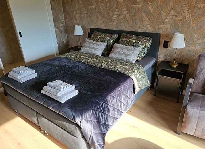 Huisje in Weerselo, vakantiehuis in Twente met groene tuin en terras, ideaal voor natuurliefhebbers.