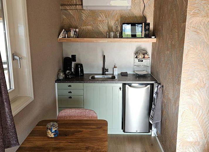 Prachtig uitzicht vanuit Huisje in Weerselo, vakantiehuis in Overijssel te midden van weelderige natuur.