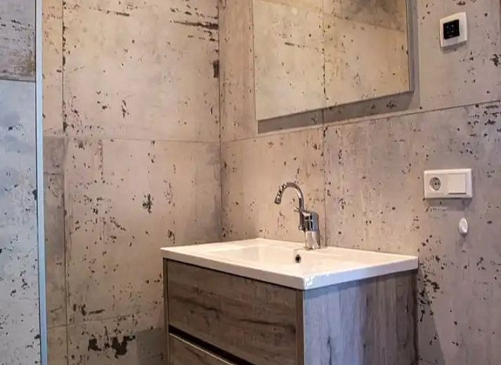 Vakantiehuis OV682 in Tilligte, Twente, bedekt met een laag sneeuw in de winter.