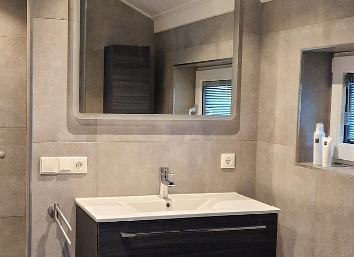 Enjoying wine and snacks on the veranda of Holiday home in Ambt Delden, Twente