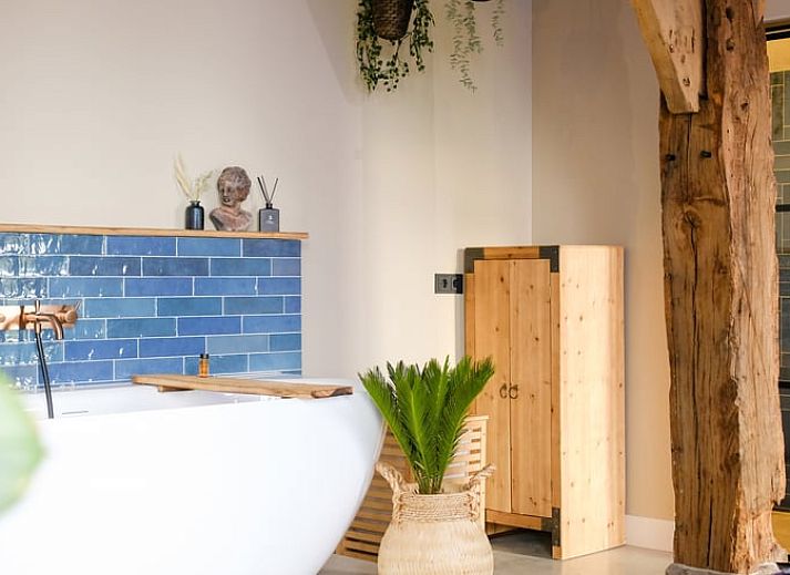 Bedroom of Huisje in Rossum, vacation home in Twente, Overijssel, with modern interior and comfortable bed.