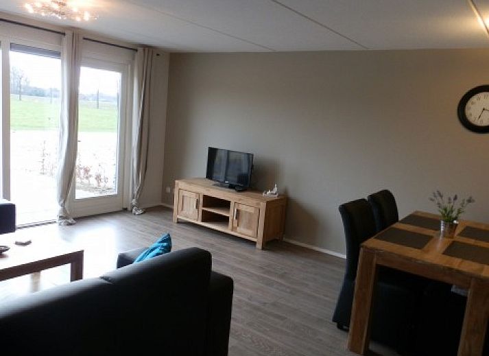 Gemuetliches Wohnzimmer der Farm Apartments 't Katreel in Haaksbergen, Twente. Gemuetliche Sitzecke in einem Ferienhaus.