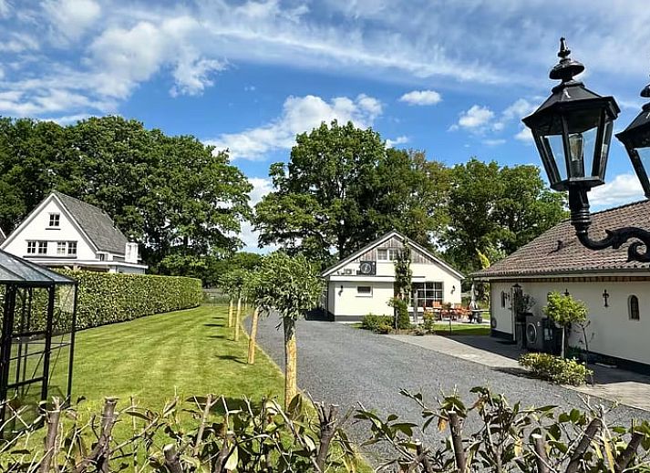 Bright interior with large windows in the cottage in Enschede, Twente.