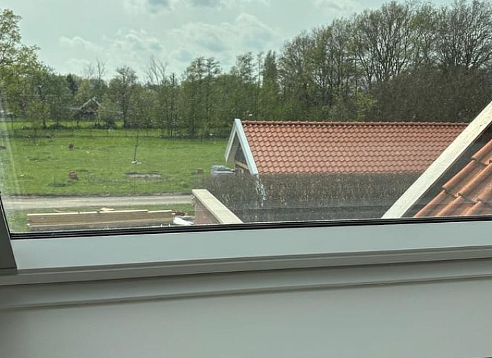 Gemuetliche Sitzecke auf der Terrasse von Huisje in Enschede, Ferienhaus in Overijssel.