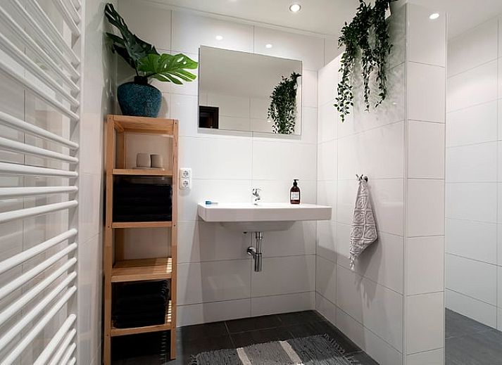 Modern kitchen in Holiday home in Markelo, Twente. Enjoy comfort and views of nature in this vacation home in Overijssel.