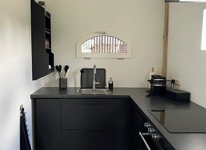 Veranda van Vakantiehuisje in Markelo met comfortabele stoelen in Twente, Overijssel.