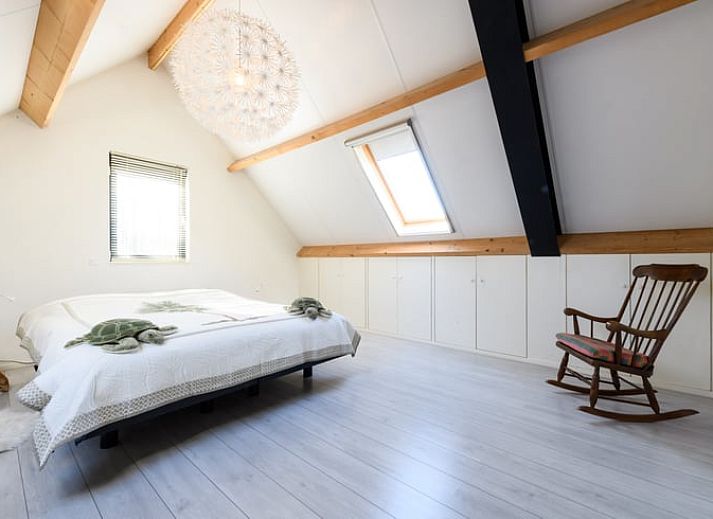 Terras van Huisje in Enter, vakantiehuis in Twente met uitzicht op groene omgeving in Overijssel.