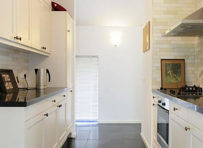 Unieke binnenruimte met moswand in Huisje in Enter, vakantiehuis in Twente, biedt rustieke charme in Overijssel.