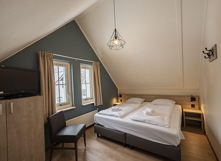 Landgoed De Elsgraven 4-persoons bungalow 4L1 in Enter, Twente, Overijssel, omgeven door groene natuur en rustieke charme.