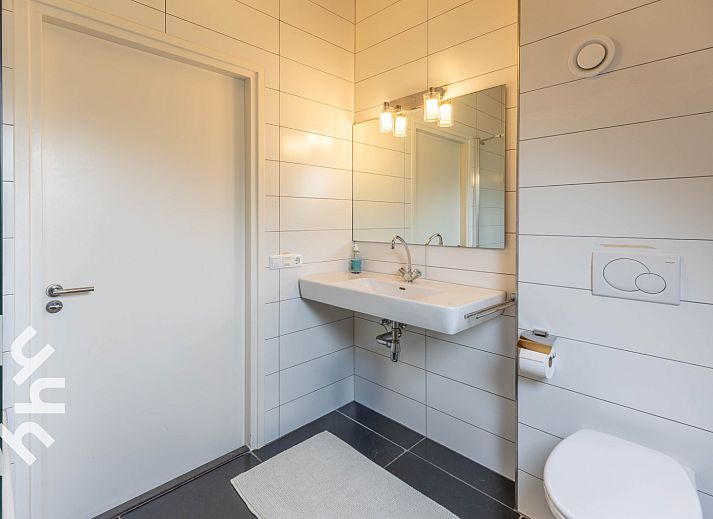 Stylish dining room in vacation home OV659, Enter, Twente with views of nature.