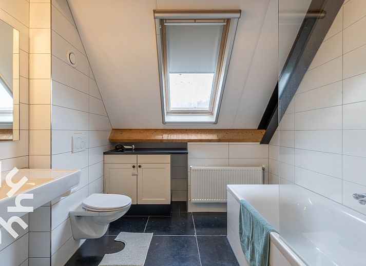 Stylish dining room in vacation home OV659, Enter, Twente with views of nature.