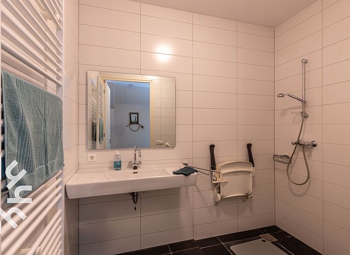 Stylish dining room in vacation home OV659, Enter, Twente with views of nature.