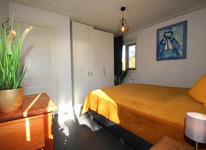 Ueberdachte Veranda im Ferienhaus DG630 in Denekamp, Twente, mit Blick auf den Garten.