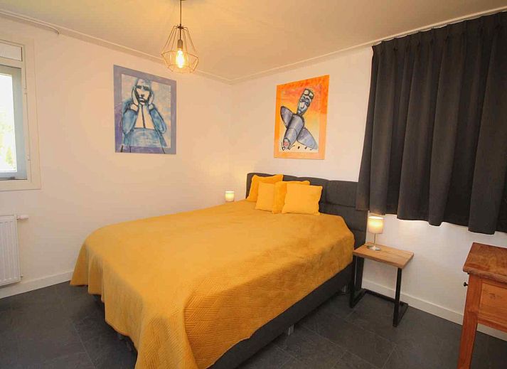 Ueberdachte Veranda im Ferienhaus DG630 in Denekamp, Twente, mit Blick auf den Garten.