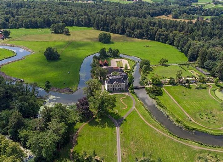Attractive bedroom in Holiday cottage in Denekamp, Twente, with wooden accents and cozy bed, located in Overijssel.