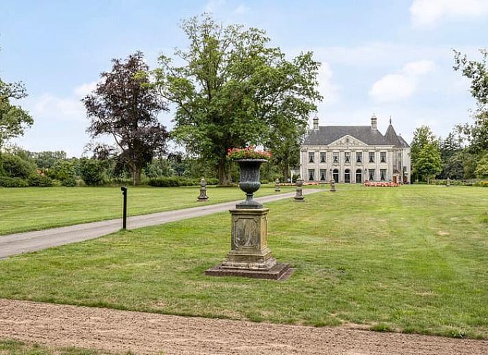 Attractive bedroom in Holiday cottage in Denekamp, Twente, with wooden accents and cozy bed, located in Overijssel.