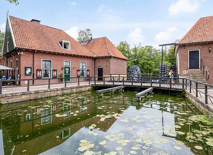 Attractive bedroom in Holiday cottage in Denekamp, Twente, with wooden accents and cozy bed, located in Overijssel.