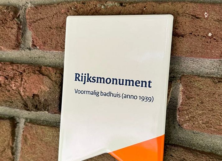 Cozy corner in Holiday Home in Denekamp, Twente, with decorative fox cushions, perfect for a relaxing stay.