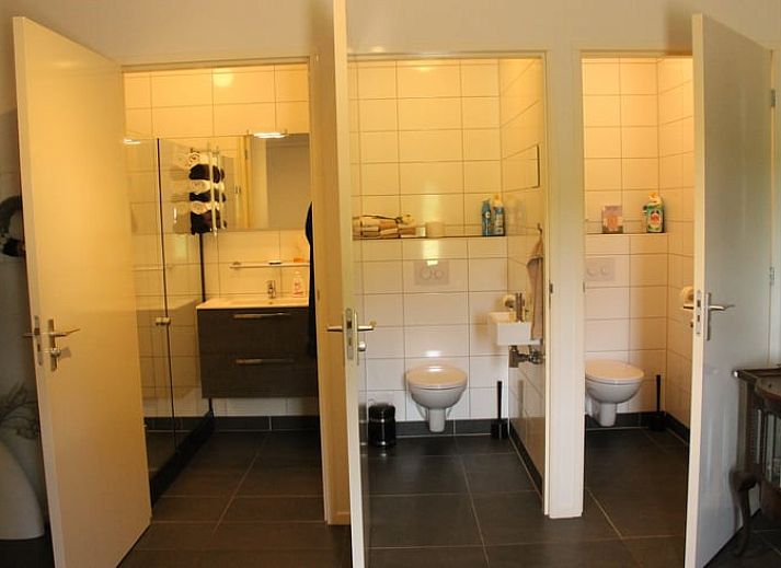 Entrance to vacation home in Denekamp, Twente, with red roof tiles and bricks. Ideal vacation home in Overijssel.