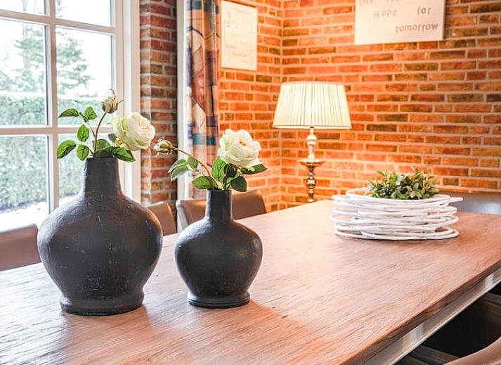 Cozy living room of Holiday home in Losser, Twente. Comfortable sitting area with natural light and stylish decor.
