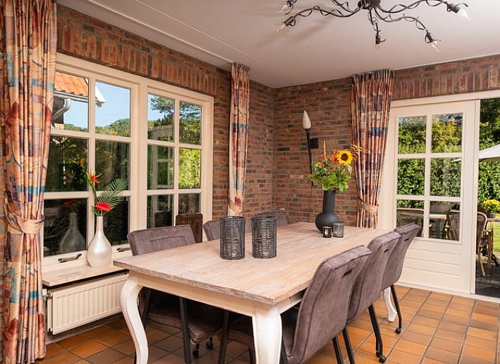 Cozy living room of Holiday home in Losser, Twente. Comfortable sitting area with natural light and stylish decor.