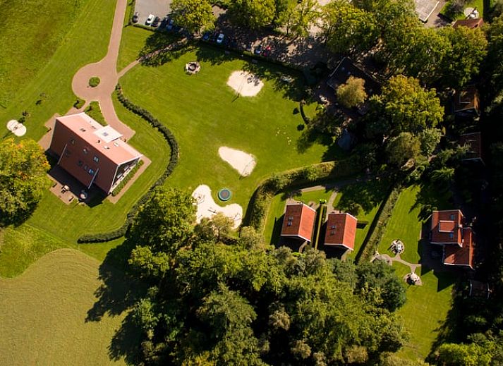 Stylish interior of Holiday Home in Losser, Twente, with comfortable seating and attractive decorations in a rural setting.