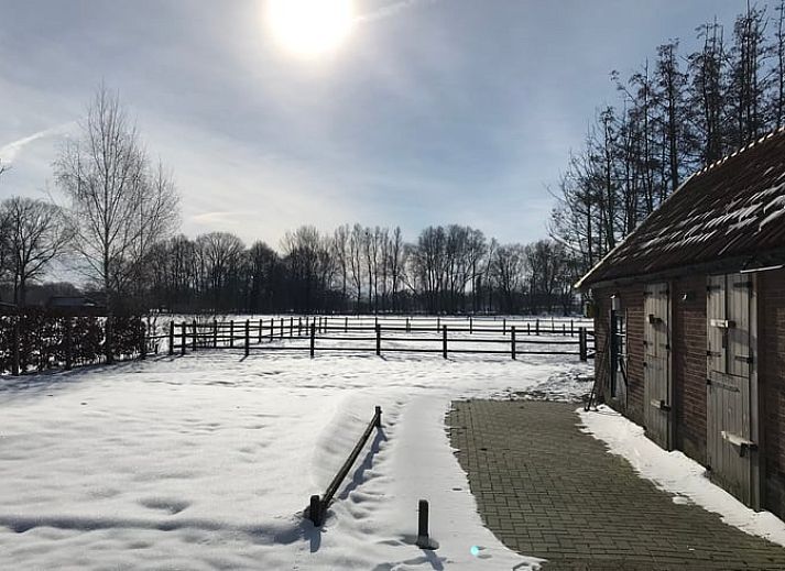 Ferienhaus in Losser, gemuetliche Sitzecke mit Ofen im Ferienhaus Overijssel.