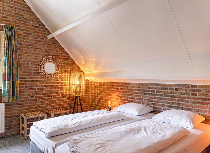 Stilvolles Wohnzimmer des Ferienhauses De Regenboog in Losser, Twente, Overijssel.