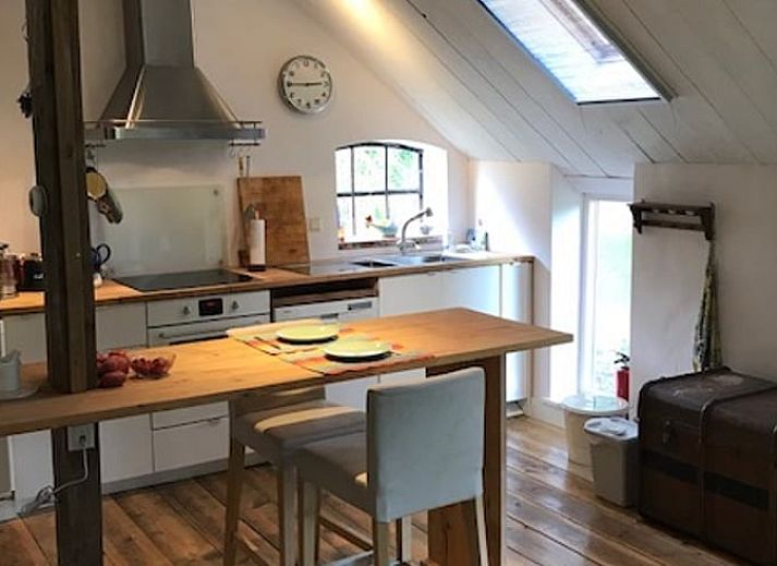 Gezellige binnenruimte van Vakantiehuisje in Hoge Hexel, Twente, met open keuken in Overijssel.