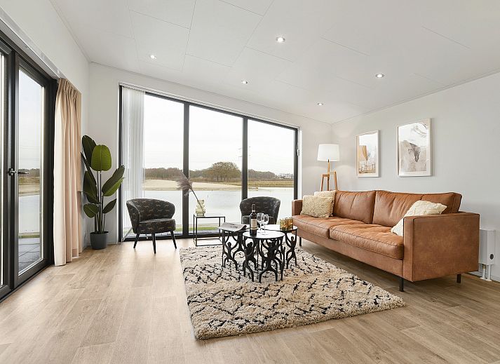 Sallandse Heuvelrug 4-persoons woning 4C in Hoge Hexel, moderne bungalow met terras in groene omgeving.