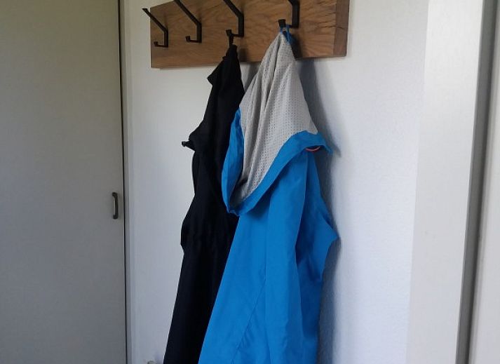 Gezellige woonkamer van Lutke Disserot vakantiehuis in Lattrop, Twente met comfortabele zithoek.